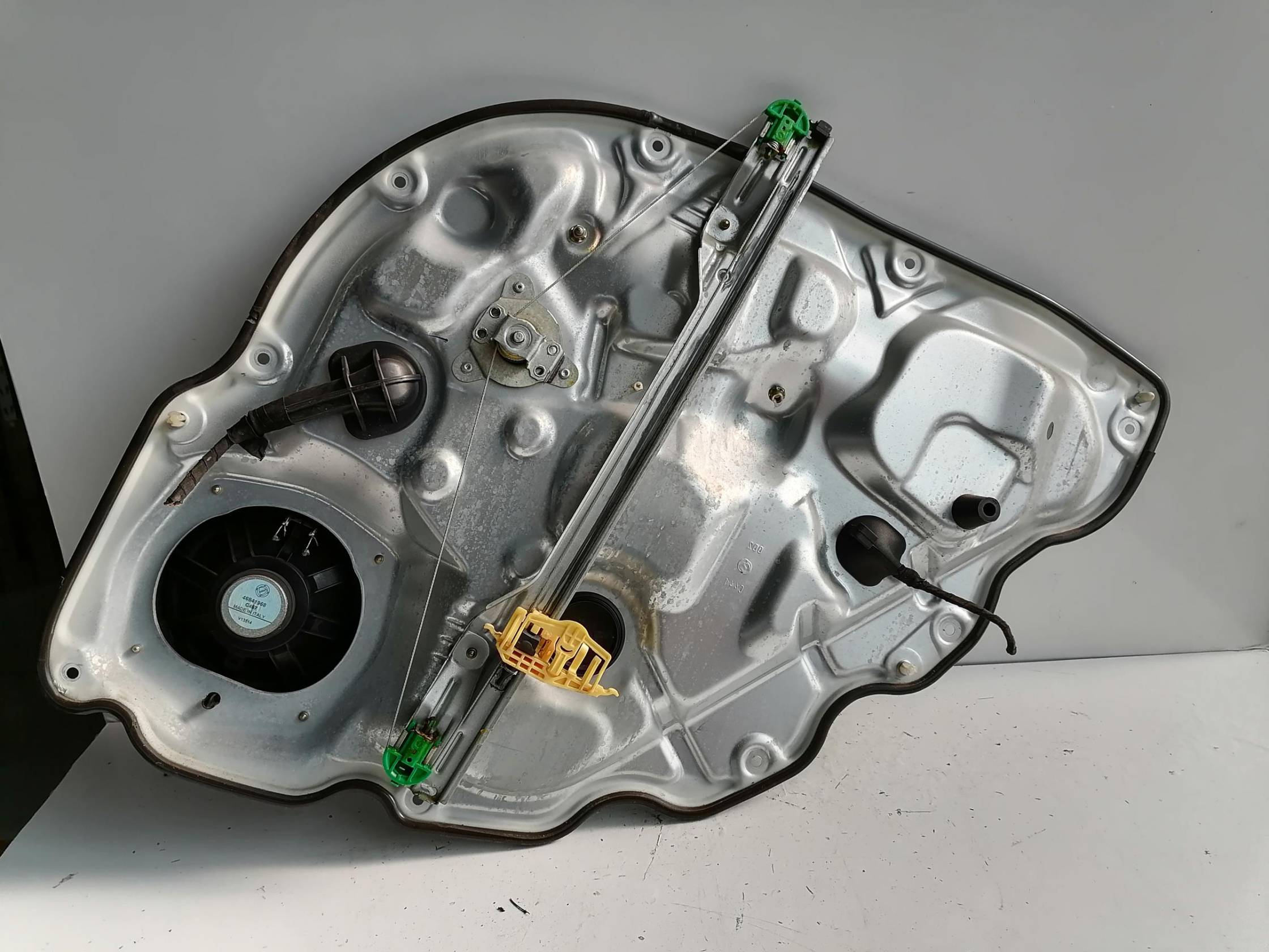 Alzacristallo elettr. porta post. sx.